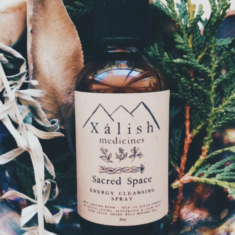 “Detail shot of Sacred Space Smudge Spray label featuring cedar and sagebrush blend.”